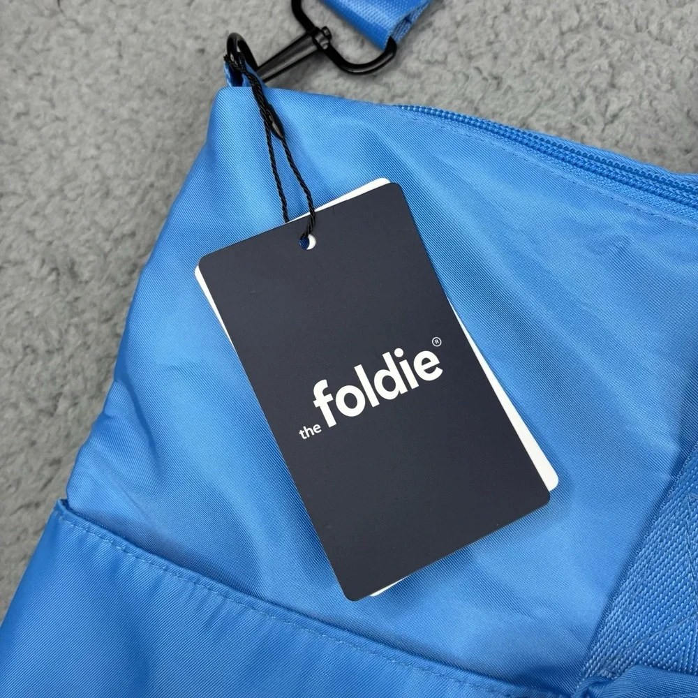 The Foldie 40L Travel Bag Carry On Expandable Azure Blue Weekender Tote NWT